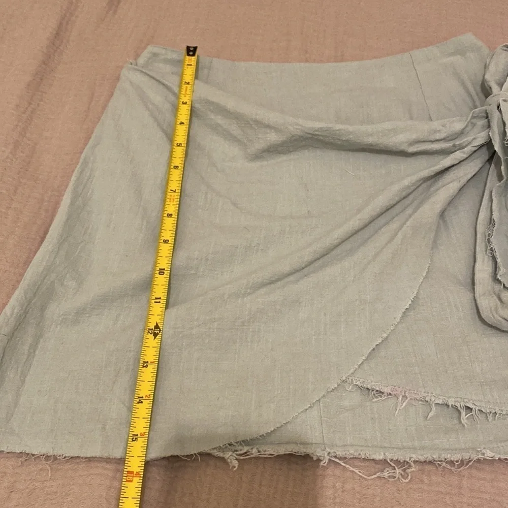 Showpo mint blue cotton mini wrap skirt .Size 4